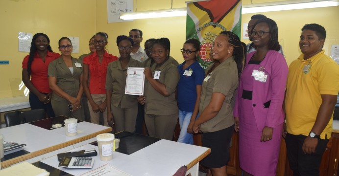 GRDB Laboratory Staff receives renewal certificate from the GNBS