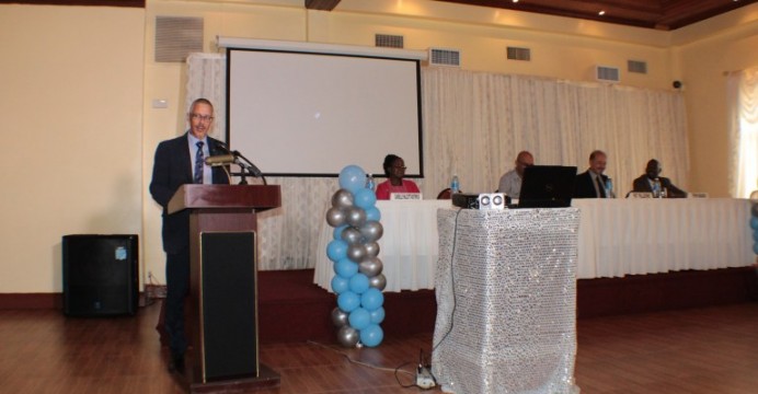 Minister of Business, Dominic Gaskin addressing the gathering