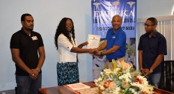 from left Shawn Manbodh, Rodlyn Semple, Andrew Boyle, and Ren Gonzales - presentaion of renewal certificate